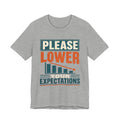 Please Lower Your Expectations Unisex T-Shirt